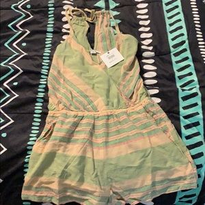 Brand new romper. Never worn!